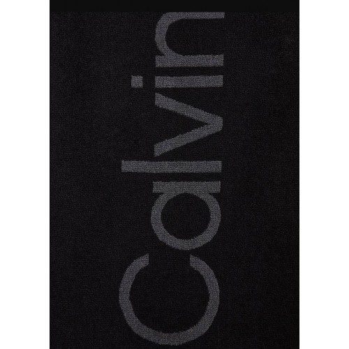 Calvin Klein unisex πετσέτα σε μαύρο και γκρι χρώμα με γράμματα 180X105 cm KU0KU00118 BEH
